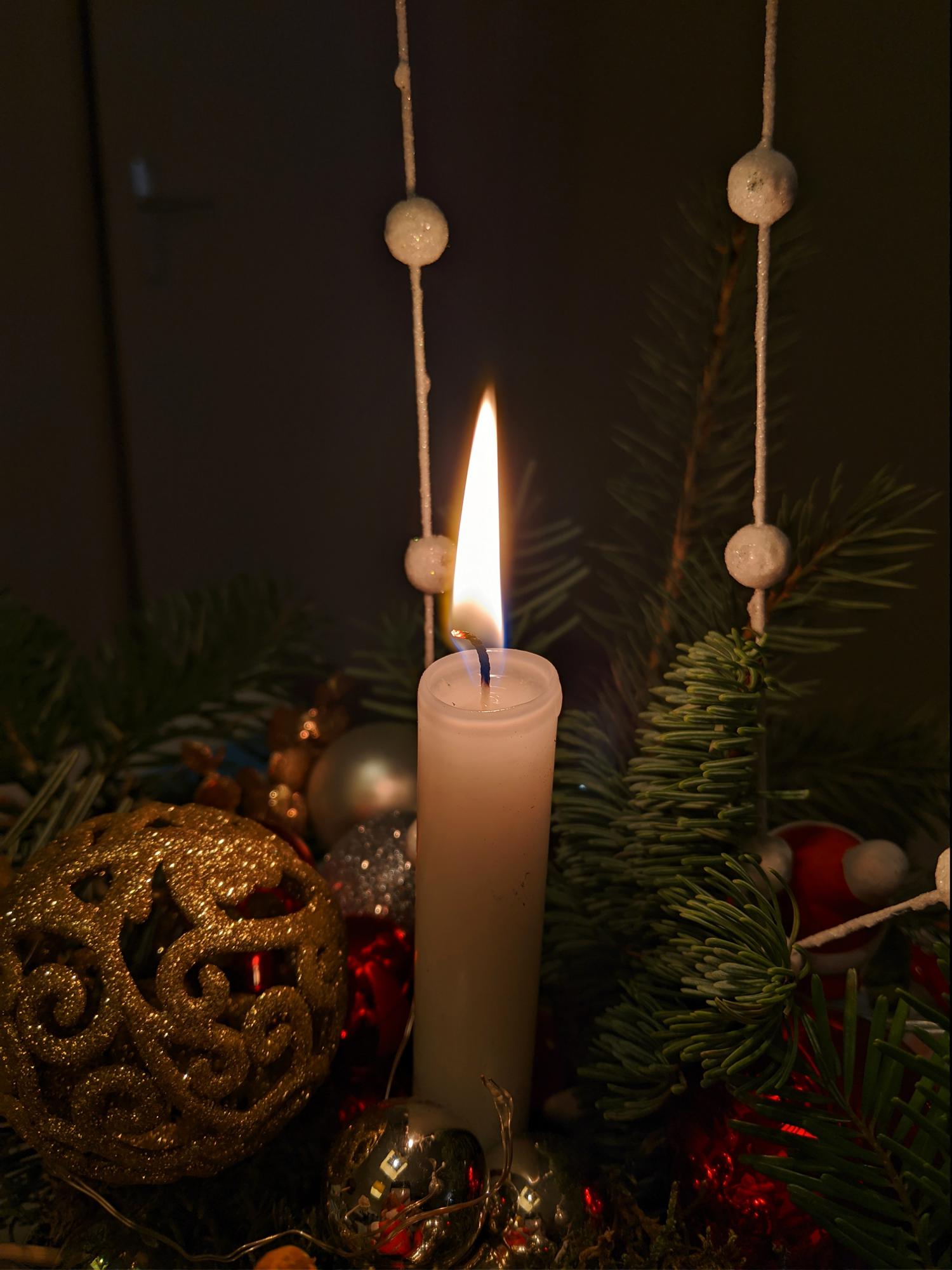 Candle in a Christmas table piece